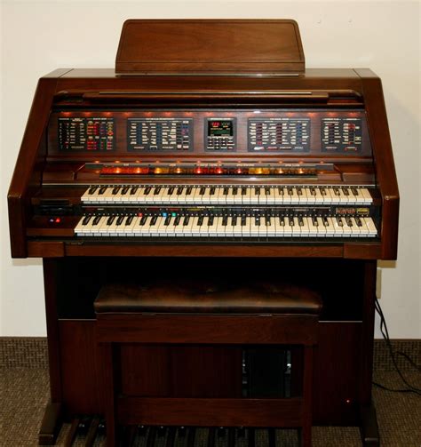 Lowrey organ - Lowrey's Heritage boasts a selection of 85 fully orchestrated rhythm patterns. An amazing assortment of musical styles are available at the touch of a button.Professionally scored introductions and endings make your performance sound great. Lowrey's Rhythm Preset button sets the whole organ up for you. 